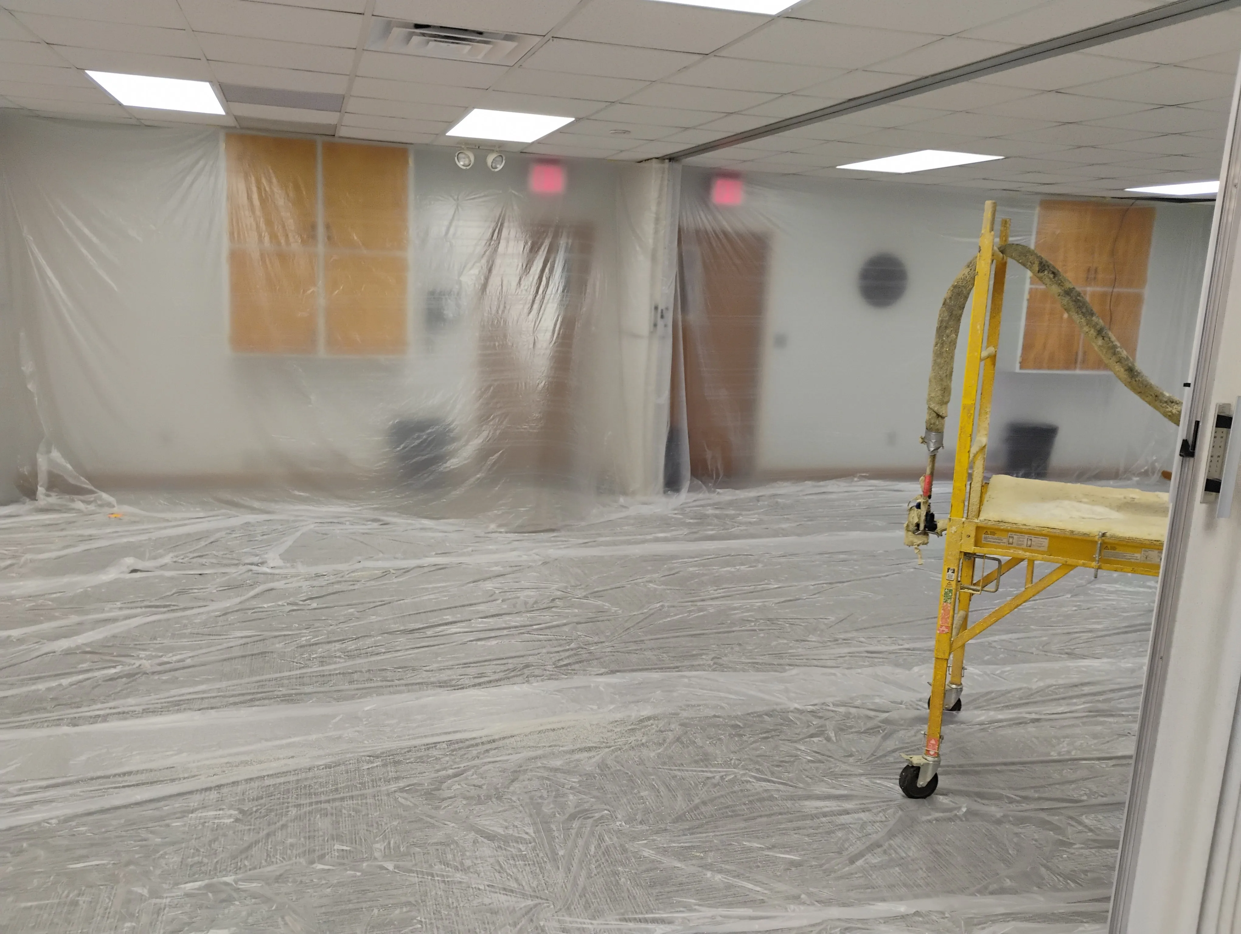 Spray foam applied in a building assembly